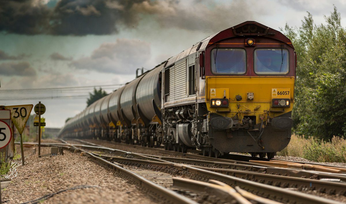 A freight train running through a rail yard