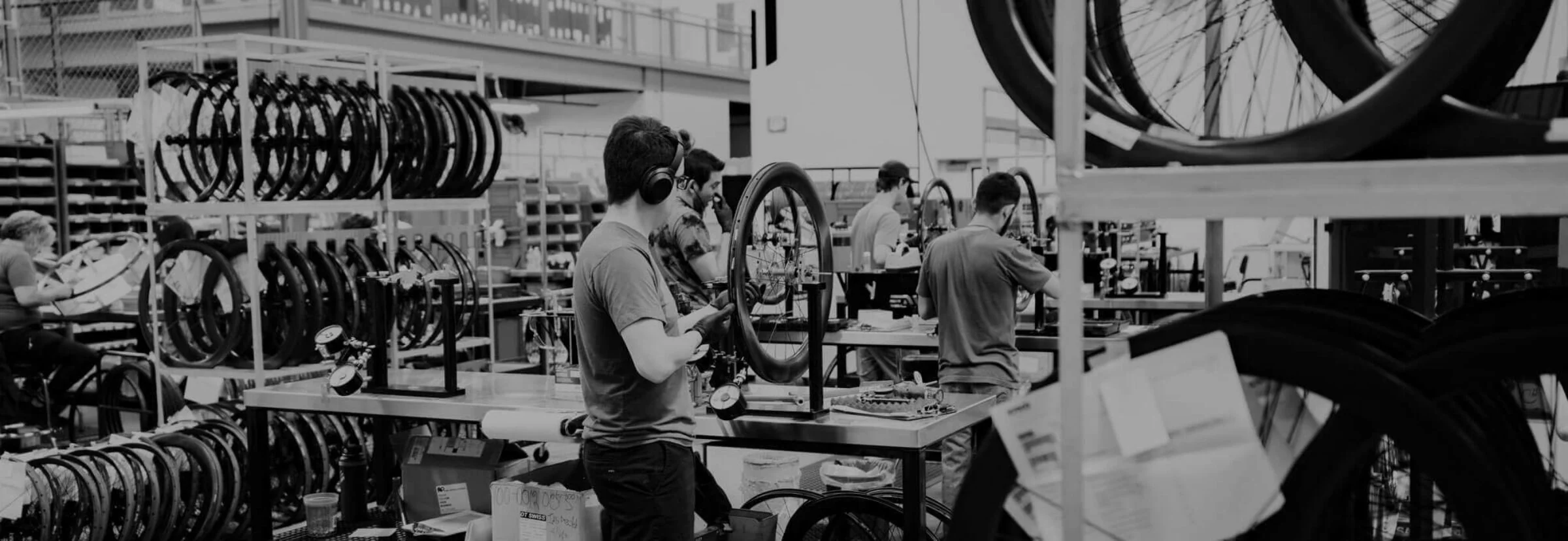 ENVE employees building and inspecting bicycle wheels inside the Ogden factory.